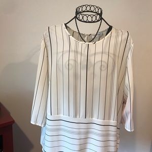 Calvin Klein cream and black top